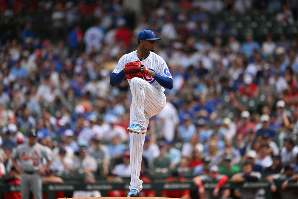 Aug 16, 2026; Chicago, Illinois, USA; Chicago Cubs pitcher Edward Cabrera (30) pitches against the St. Louis Cardinals during the first inning at Wrigley Field.