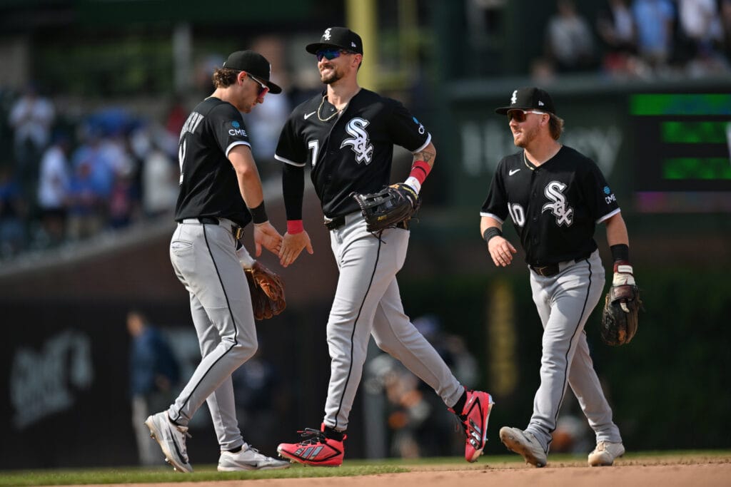 Aug 19, 2026; Chicago, Illinois, USA; Chicago White Sox outfielder Brenton Doyle (7) celebrates with shortstop Colson Montgomery (12) and second baseman Chase Meidroth (10) after defeating the Chicago Cubs at Wrigley Field.