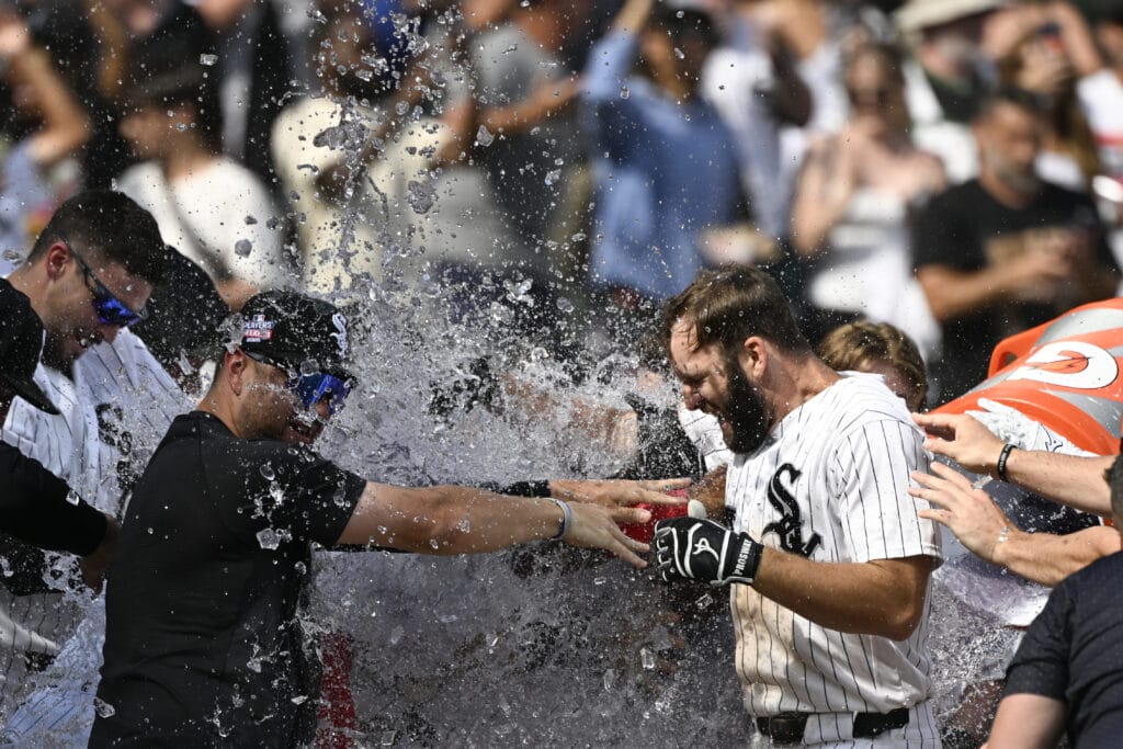 Aug 23, 2026; Chicago, Illinois, USA; Chicago White Sox center fielder Tristan Peters (29), right, is doused by his teammates after he hits a walk-off home run during the ninth inning against the New York Mets at Rate Field.