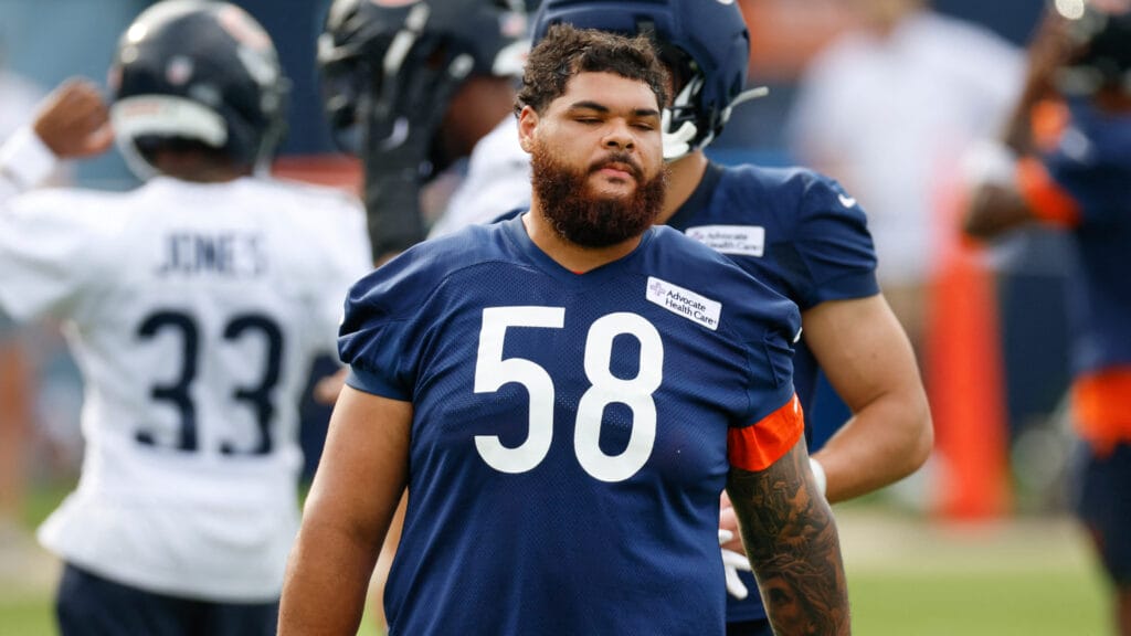 Jul 31, 2026; Lake Forest, IL, USA; Chicago Bears offensive tackle Darnell Wright (58) walks on he field during Training Camp at Halas Hall. Mandatory Credit: Kamil Krzaczynski-Imagn Images