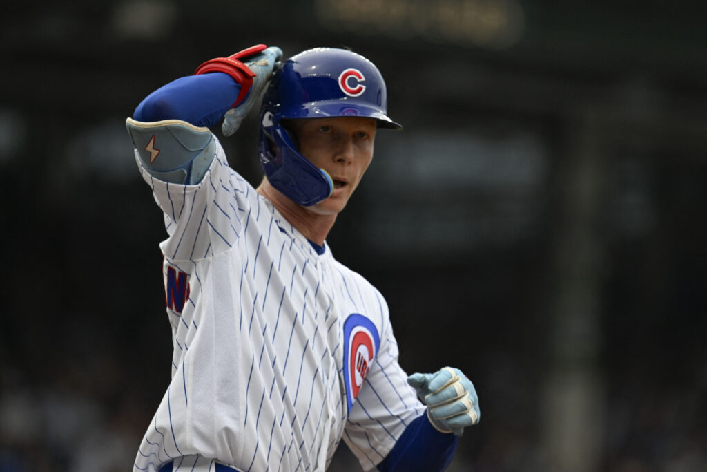 Aug 29, 2026; Chicago, Illinois, USA; Chicago Cubs center fielder Pete Crow-Armstrong (4) gestures after hitting a two-run home run during the second inning against the Cincinnati Reds at Wrigley Field.