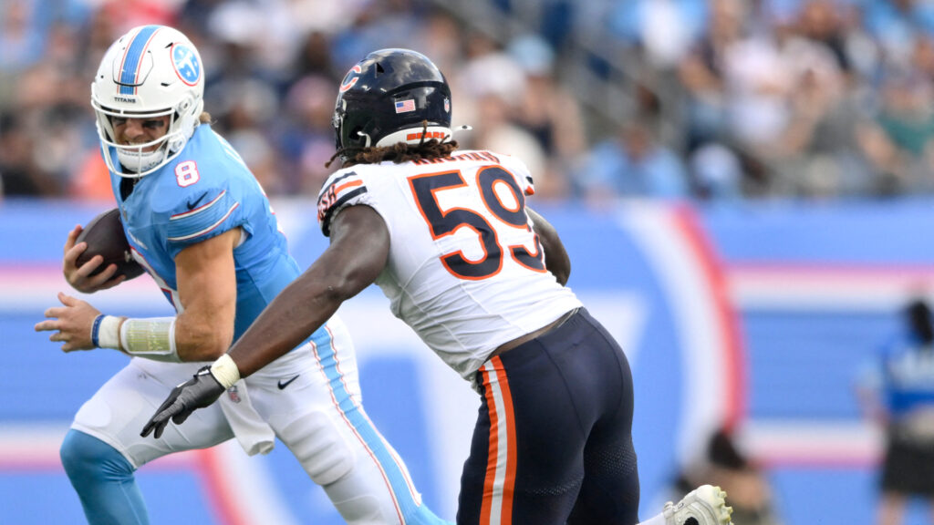 Aug 29, 2026; Nashville, Tennessee, USA; Tennessee Titans quarterback Will Levis (8) runs against Chicago Bears defensive line Jamree Kromah (59) during the second quarter at Nissan Stadium. Mandatory Credit: Steve Roberts-Imagn Images
