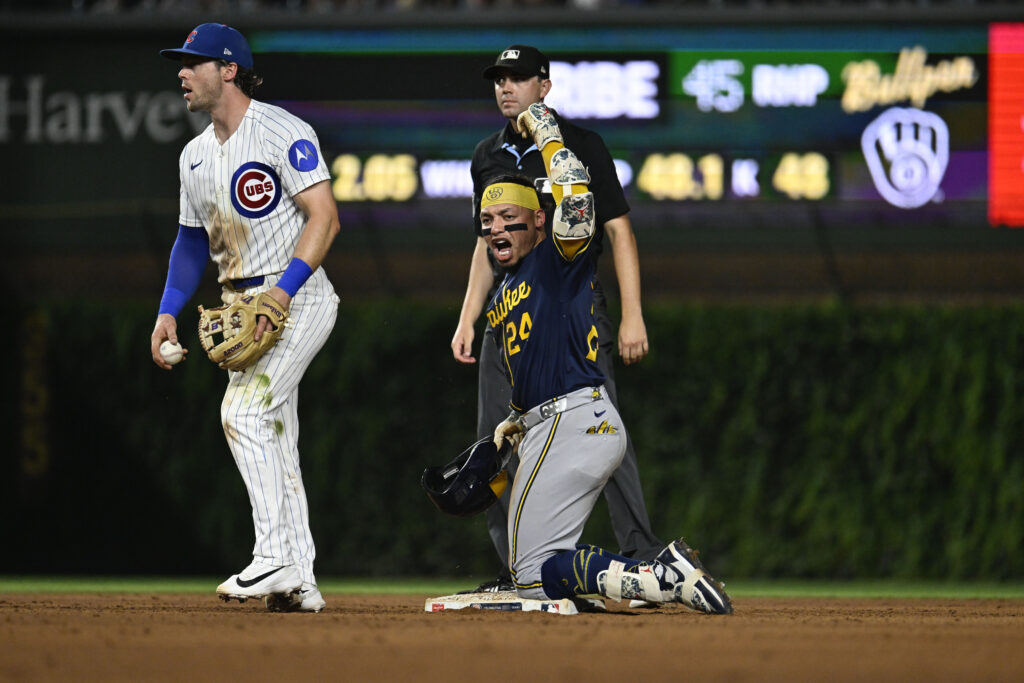 Sep 1, 2026; Chicago, Illinois, USA; Milwaukee Brewers catcher William Contreras (24) yells after he hits an RBI double during the seventh inning against the Chicago Cubs at Wrigley Field.