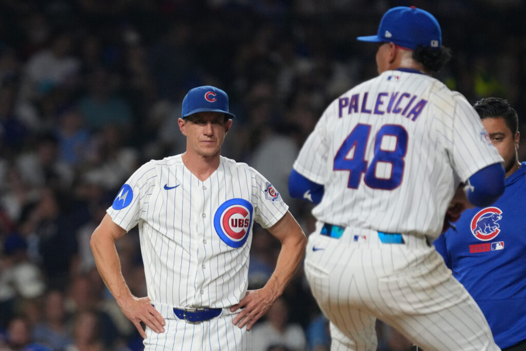 Sep 2, 2026; Chicago, Illinois, USA; Chicago Cubs manager Craig Counsell (11) watches pitcher Daniel Palencia (48) to make sure he's alright against the Milwaukee Brewers during the seventh inning at Wrigley Field.