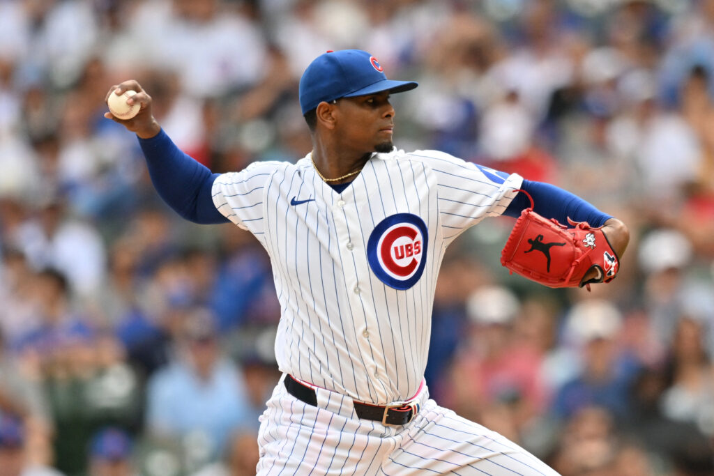 Aug 16, 2026; Chicago, Illinois, USA; Chicago Cubs pitcher Edward Cabrera (30) pitches against the St. Louis Cardinals during the first inning at Wrigley Field.