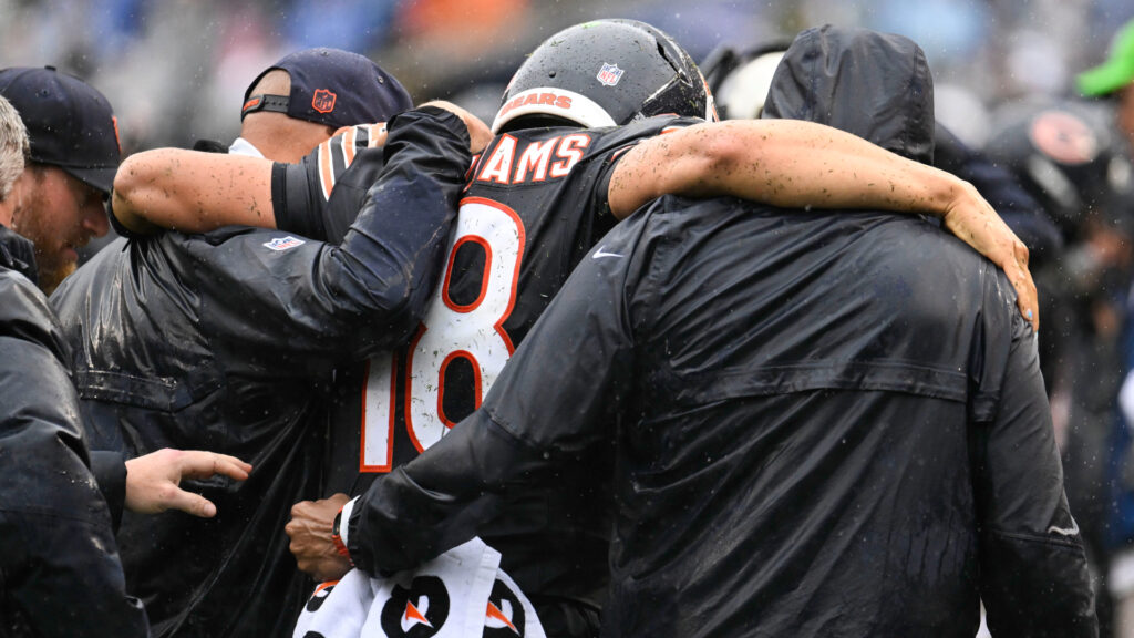Sep 20, 2026; Chicago, Illinois, USA; Chicago Bears quarterback Caleb Williams (18) is helped off the field with an apparent injury against the Minnesota Vikings during the second half at Soldier Field. Mandatory Credit: Matt Marton-Imagn Images