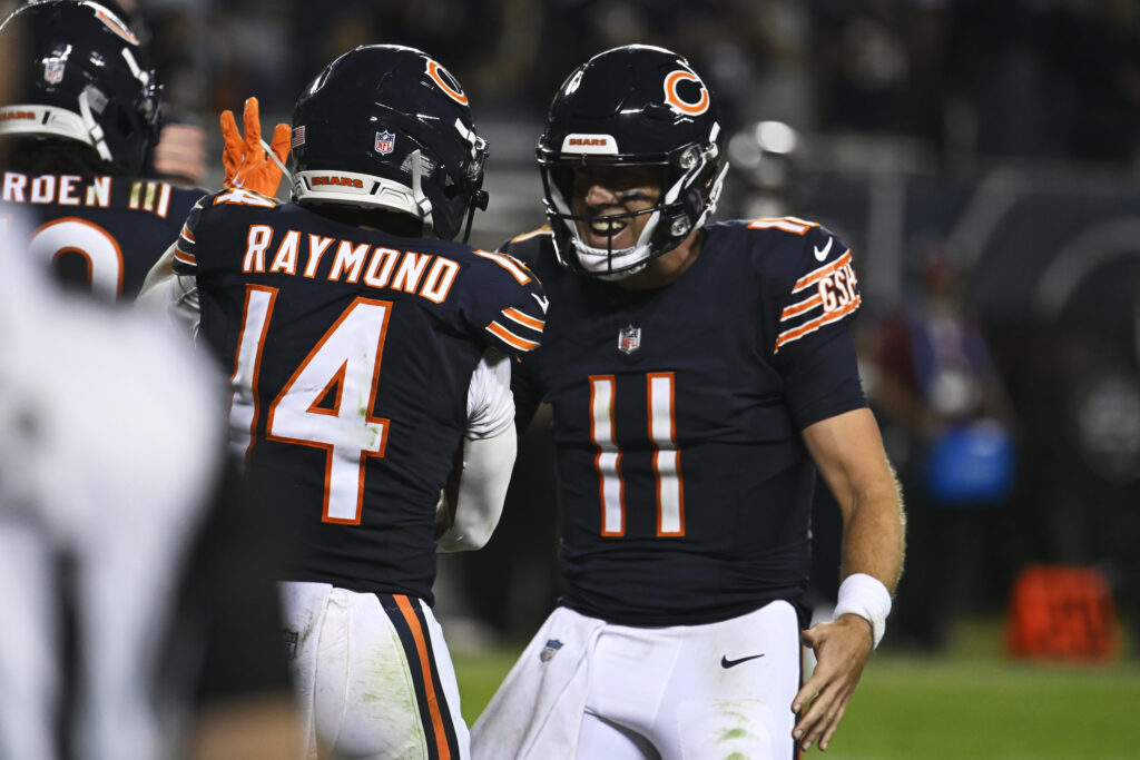 Sep 28, 2026; Chicago, Illinois, USA; Chicago Bears wide receiver Kalif Raymond (14) celebrates with quarterback Case Keenum (11) after scoring a touchdown against the Philadelphia Eagles during the second half at Soldier Field. Mandatory Credit: Matt Marton-Imagn Images