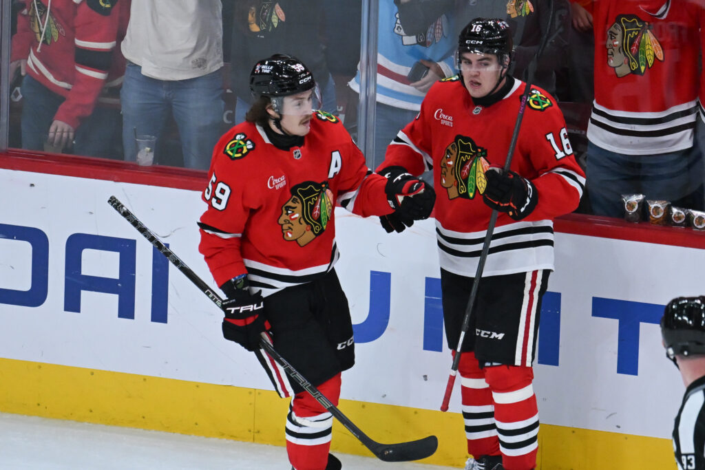 Oct 13, 2026; Chicago, Illinois, USA; Chicago Blackhawks left wing Tyler Bertuzzi (59) celebrates his goal against the Pittsburgh Penguins with center Anton Frondell (16) during the third period at United Center. Mandatory Credit: Matt Marton-Imagn Images