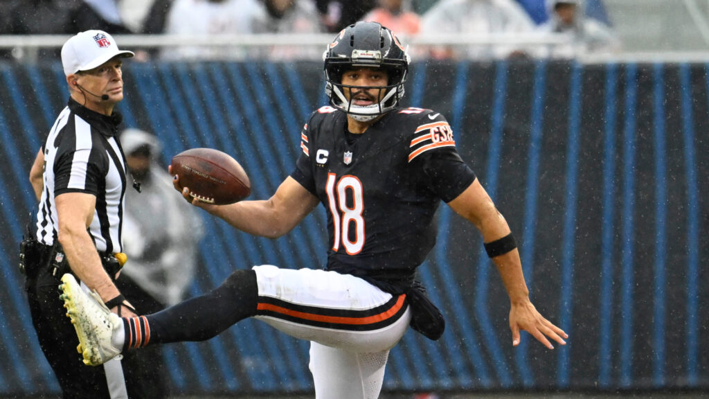 Sep 20, 2026; Chicago, Illinois, USA; Chicago Bears quarterback Caleb Williams (18) runs from Minnesota Vikings linebacker Dallas Turner (15) during the first half at Soldier Field. Mandatory Credit: Matt Marton-Imagn Images