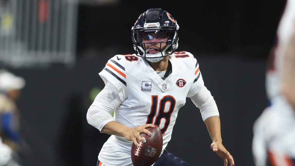 Oct 18, 2026; Atlanta, Georgia, USA; Chicago Bears quarterback Caleb Williams (18) rolls out with the ball during the fourth quarter against the Atlanta Falcons at Mercedes-Benz Stadium. Mandatory Credit: Brett Davis-Imagn Images