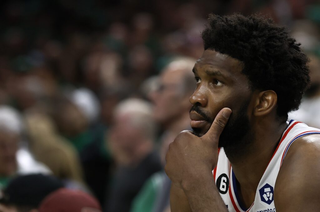 Joel Embiid sitting on the bench during Game 7 of the Sixers' series vs. the Celtics.