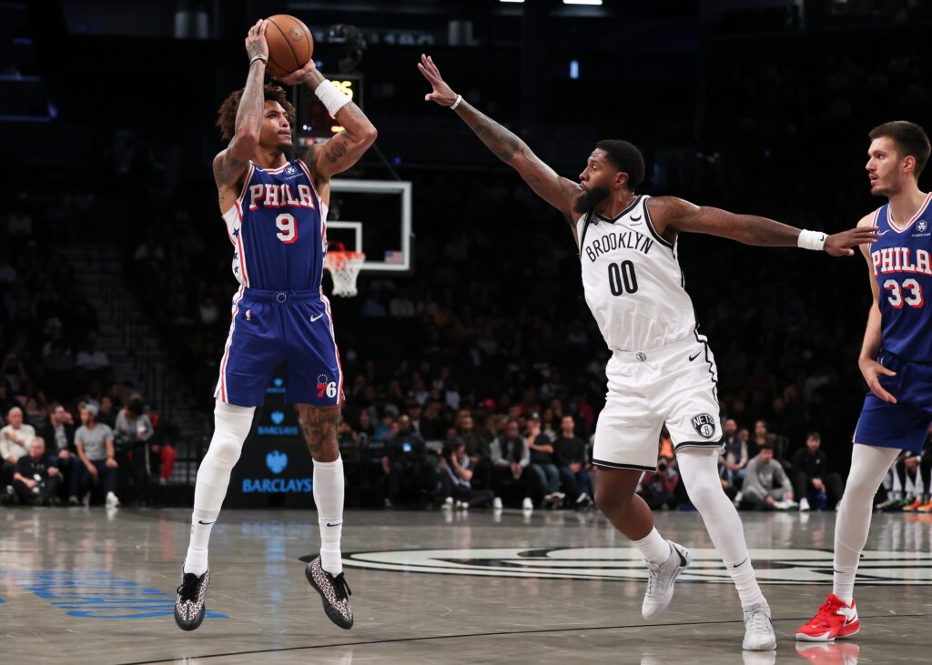 Kelly Oubre rises up to shoot a three against the Brooklyn Nets.
