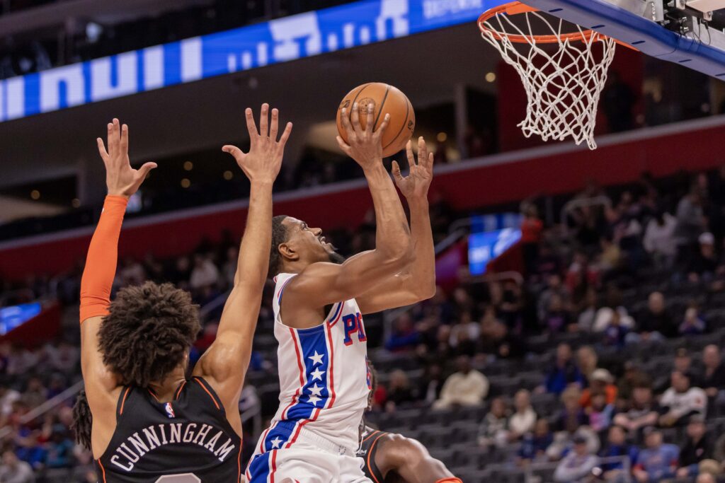 Tyrese Maxey shoots a layup against the Pistons.