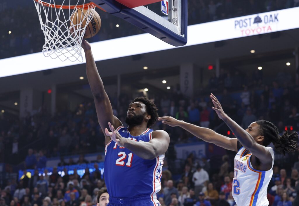 Joel Embiid shooting a layup vs. the Thunder.