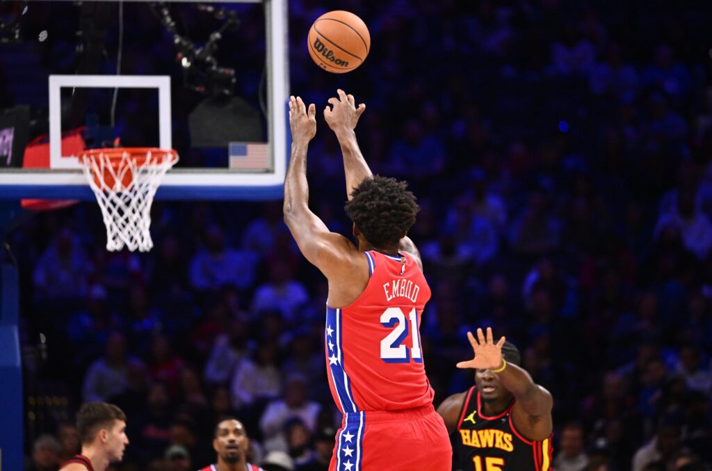 Joel Embiid shoots a three against the Atlanta Hawks.