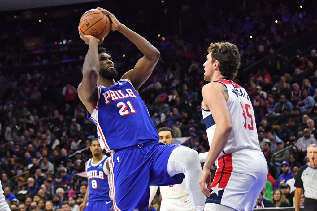 Joel Embiid taking a fadeaway jumper against the Wizards.