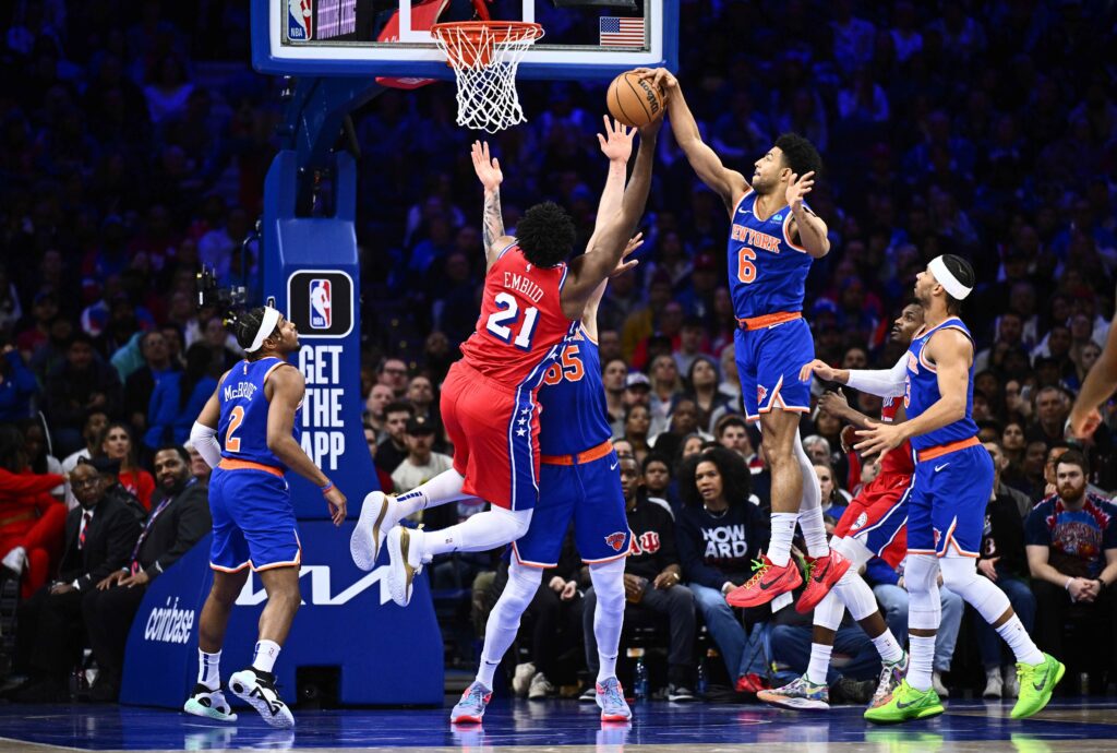 Joel Embiid gets blocked at the rim driving at the Knicks.