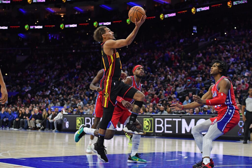 Trae Young scoring against the Sixers.