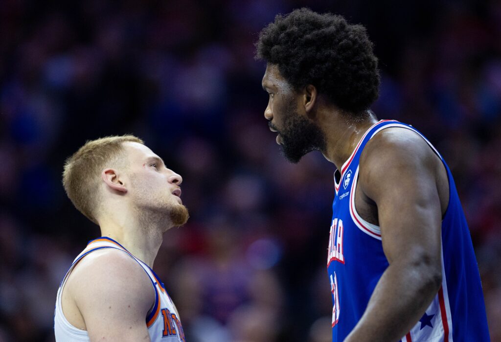 Joel Embiid staring down Donte DiVincenzo.