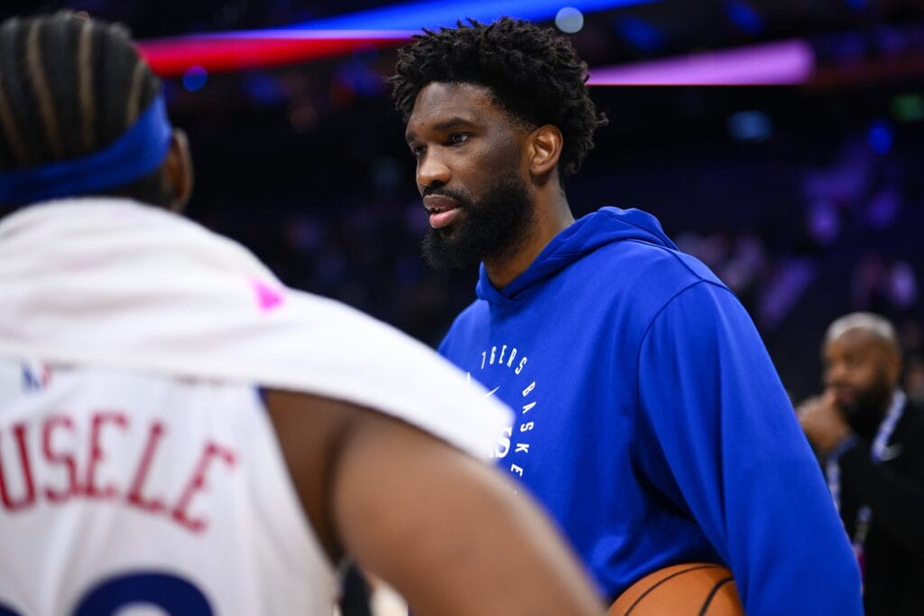 Joel Embiid talking to Guerschon Yabusele.