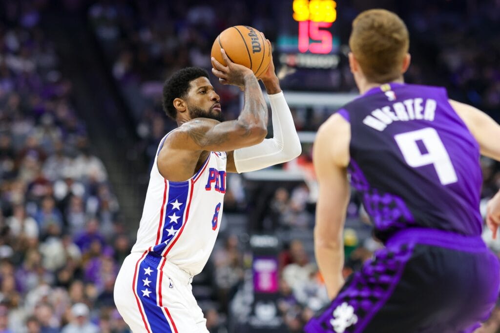 Paul George lining up to shoot a three against the Kings.