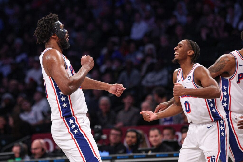 Joel Embiid fist pumping with Tyrese Maxey