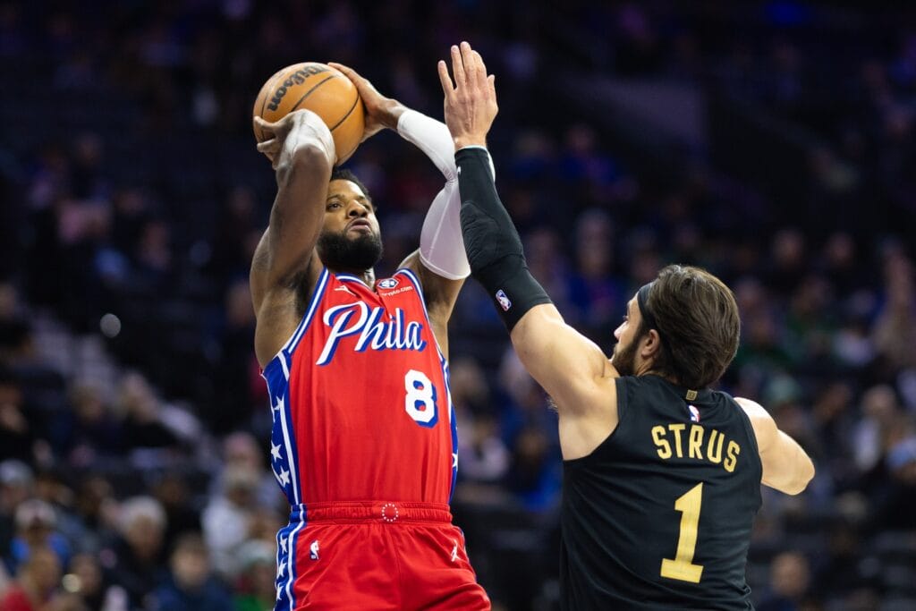 Paul George pulling up for a three-point shot against Cleveland.