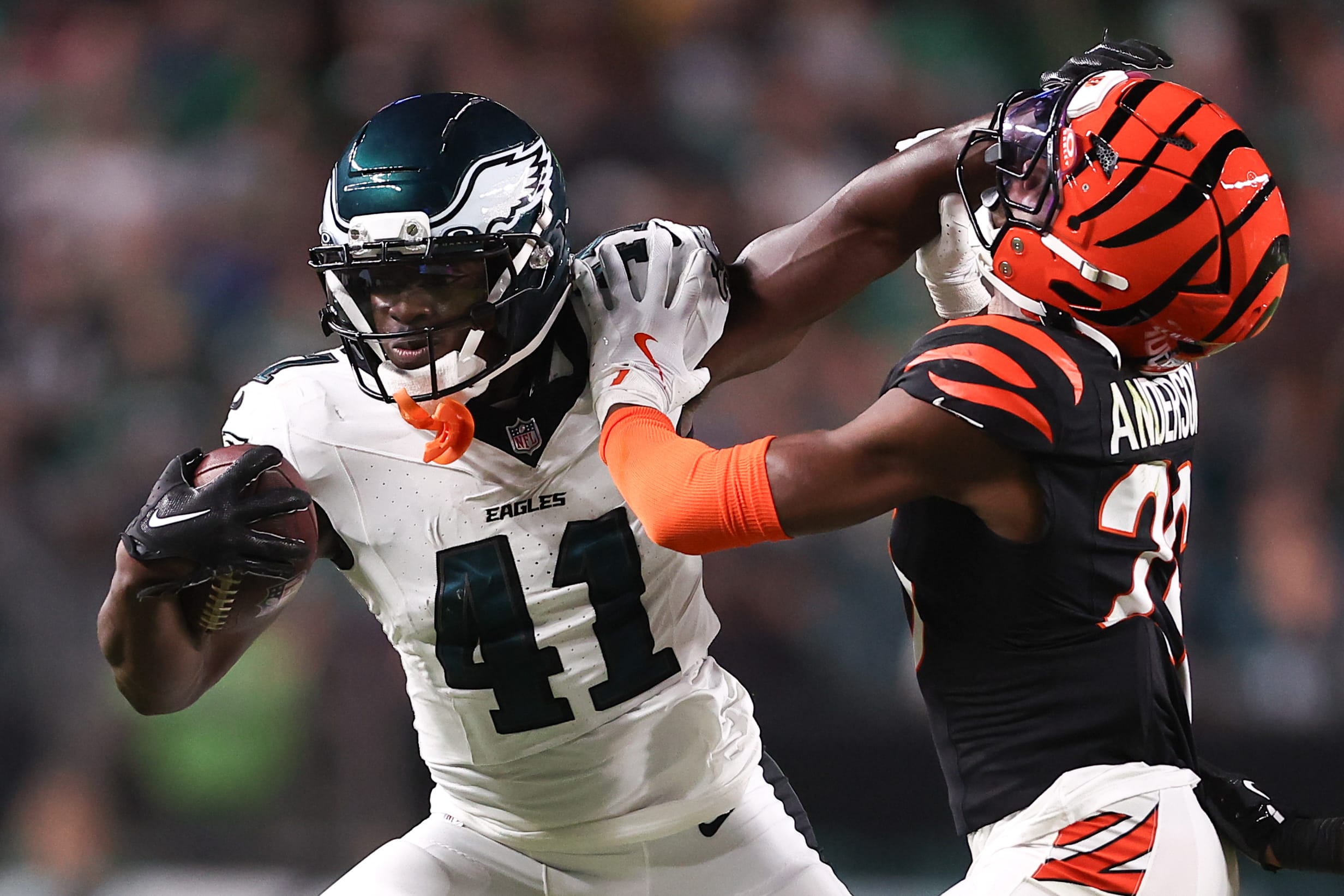 Eagles wide receiver Darius Cooper (41) runs with the ball against Cincinnati Bengals safety Tycen Anderson (26) after a catch during the second quarter at Lincoln Financial Field. Mandatory Credit: Bill Streicher-Imagn Images