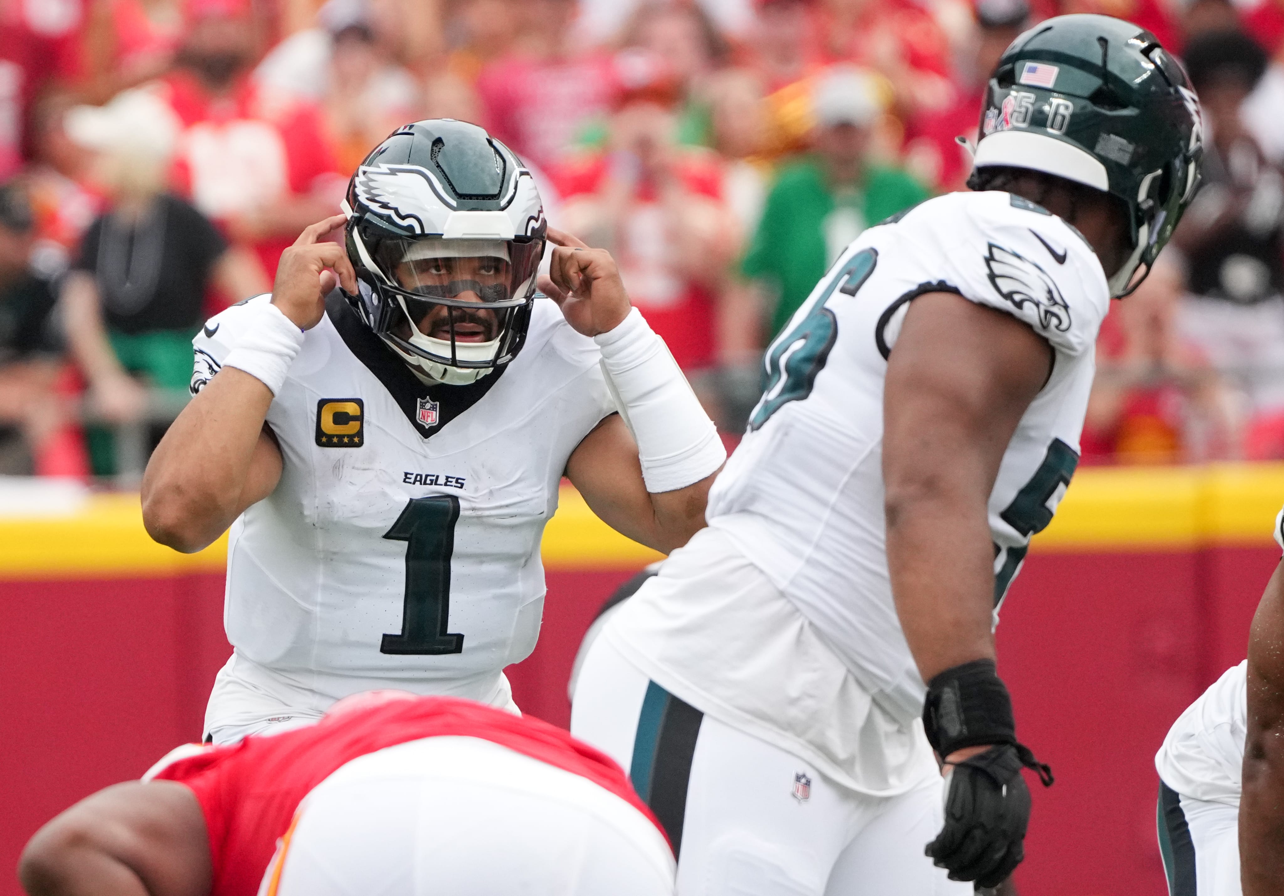 Eagles quarterback Jalen Hurts (1) calls a play line of scrimmage against the Kansas City Chiefs during the second quarter of the game at GEHA Field at Arrowhead Stadium. Mandatory Credit: Denny Medley-Imagn Images