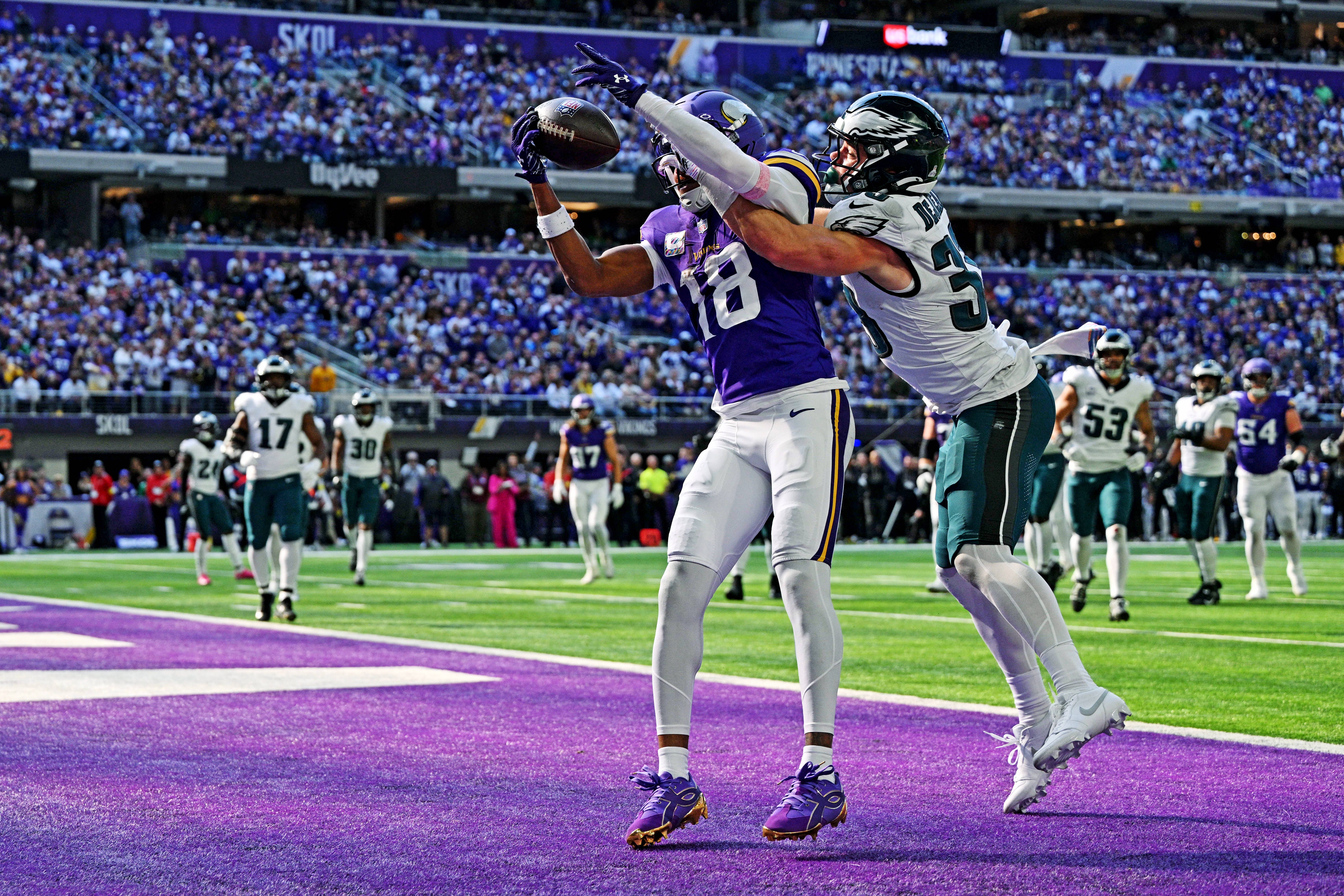 Vikings wide receiver Justin Jefferson (18) is unable to make a catch during the second half after being blocked by Philadelphia Eagles cornerback Cooper Dejean (33) at U.S. Bank Stadium. Mandatory Credit: Jeffrey Becker-Imagn Images