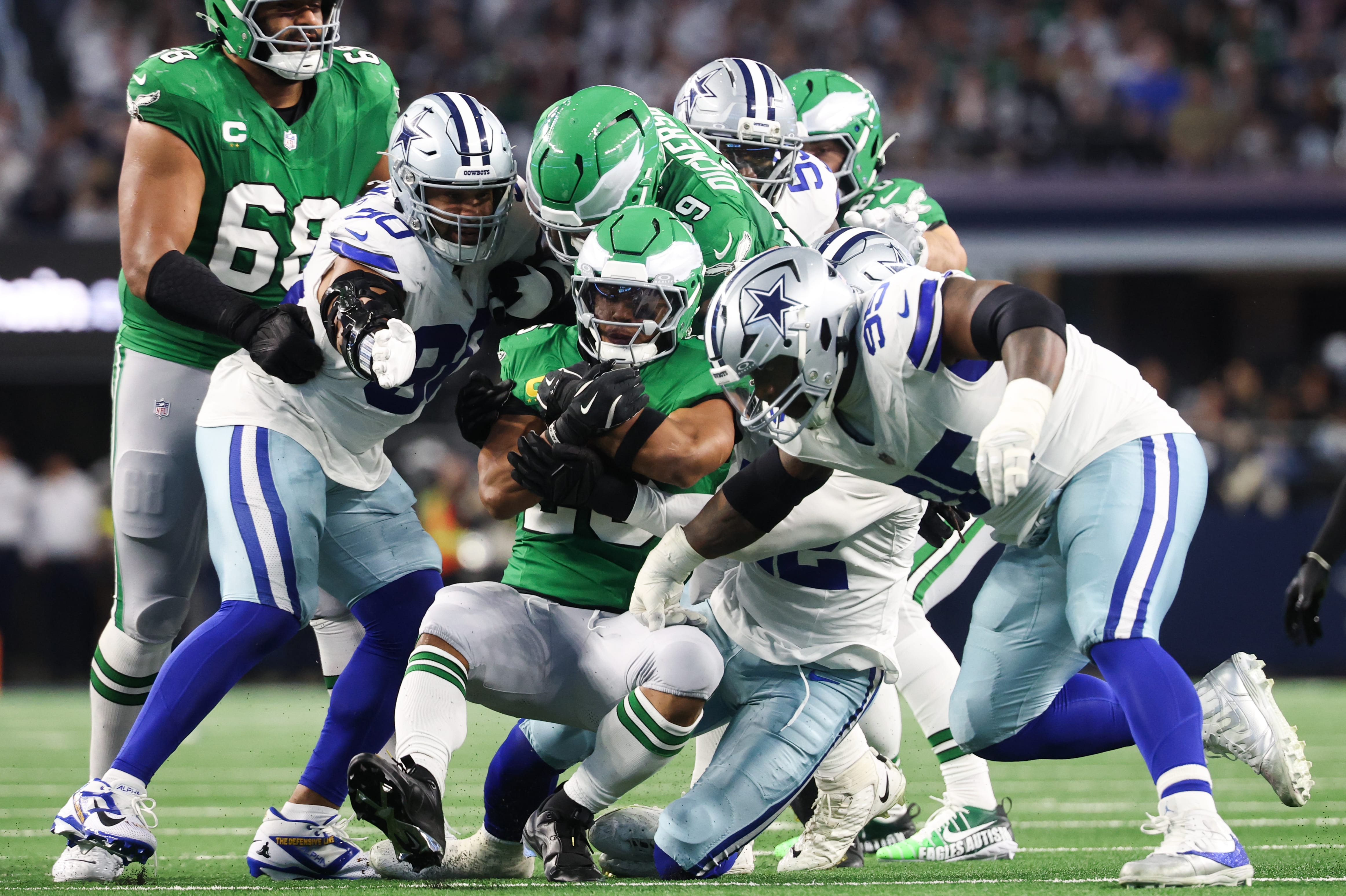 Eagles running back Saquon Barkley (26) is brought down in the second quarter against the Dallas Cowboys at AT&T Stadium. Mandatory Credit: Kevin Jairaj-Imagn Images