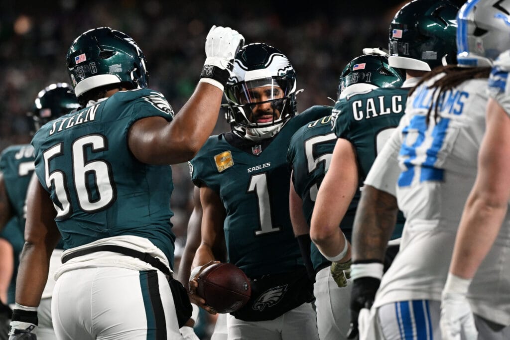 Eagles quarterback Jalen Hurts (1) scores a touchdown against the Detroit Lions during the first half at Lincoln Financial Field. | Eric Hartline-Imagn Images