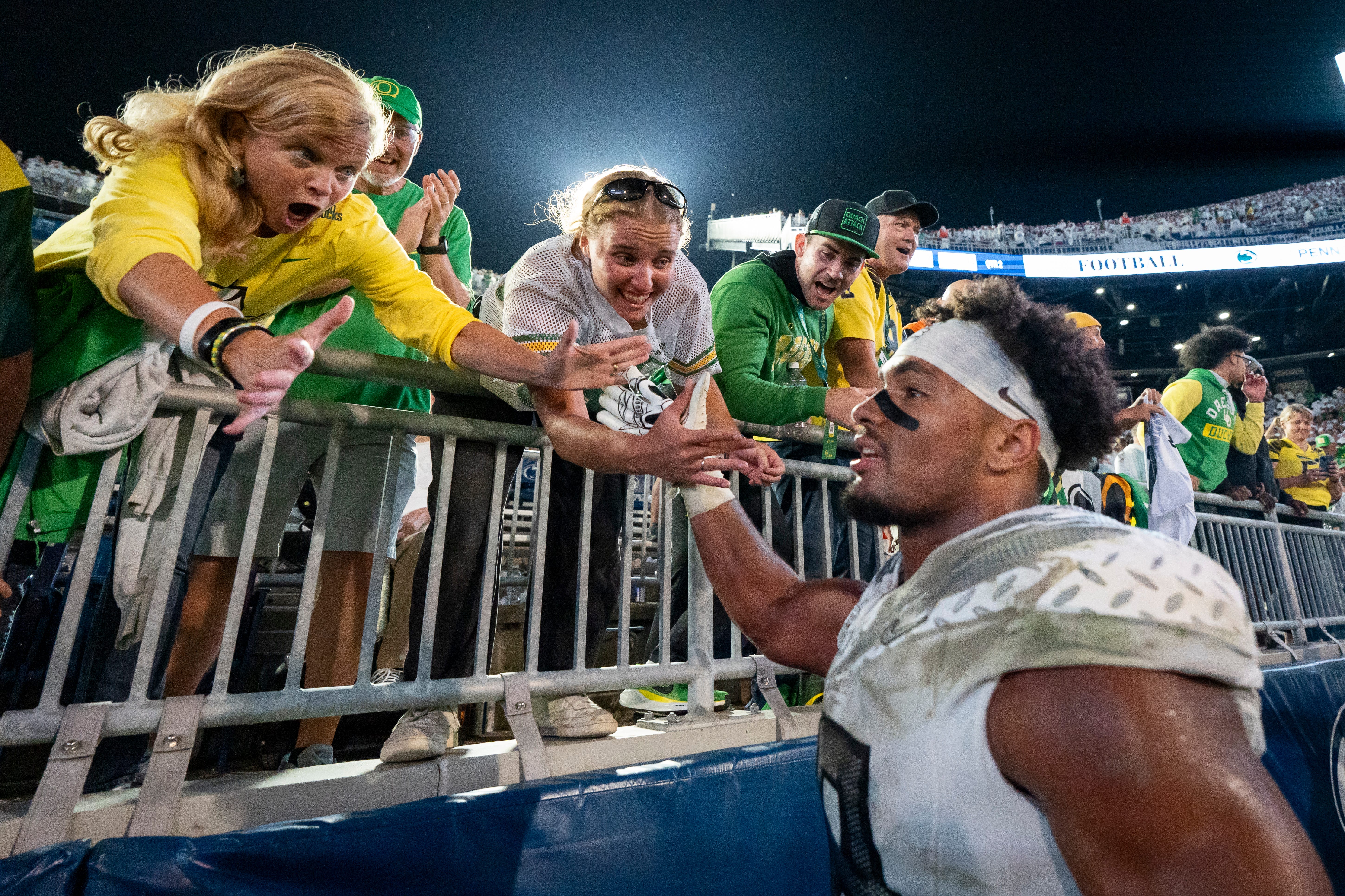 Oregon tight end Kenyon Sadiq celebrates with fans as the Oregon Ducks face the Penn State Nittany Lions on Sept. 27, 2025, at Beaver Stadium in University Park, Pennsylvania.