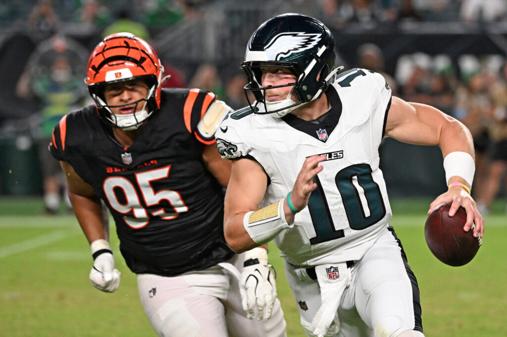 Aug 28, 2026; Philadelphia, Pennsylvania, USA; Philadelphia Eagles quarterback Cole Payton (10) under pressure form Cincinnati Bengals defensive tackle Howard Cross III (95) during the second half at Lincoln Financial Field. Mandatory Credit: Eric Hartline-Imagn Images