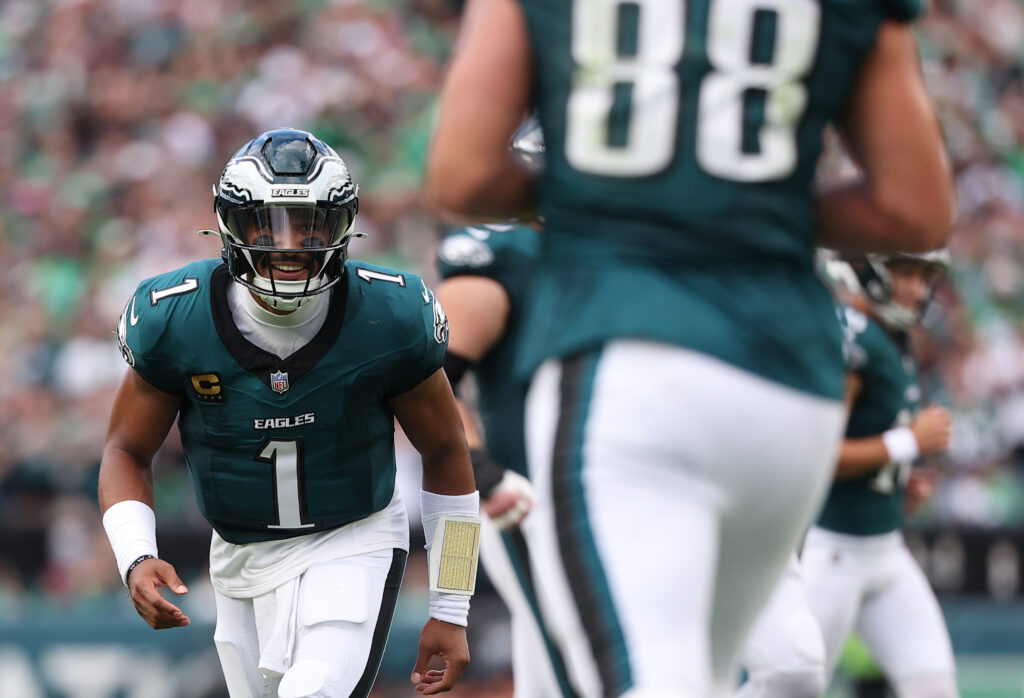 Eagles quarterback Jalen Hurts (1) reacts after a play against the Washington Commanders during the first half at Lincoln Financial Field. Mandatory Credit: Bill Streicher-Imagn Images